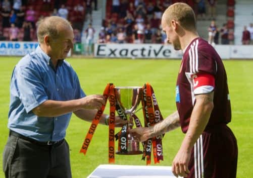 Jamie Hamill collects the Supporters Direct Scotland Cup from the Head of Supporters Direct Scotland Paul Goodwin. Picture: SNS