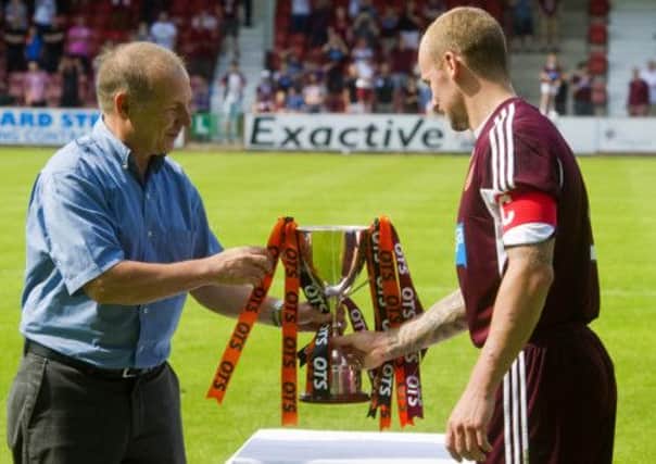 Jamie Hamill collects the Supporters Direct Scotland Cup from the Head of Supporters Direct Scotland Paul Goodwin. Picture: SNS