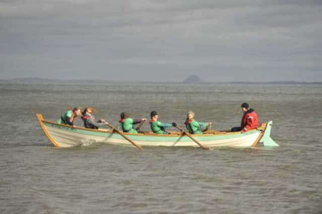 A group of Edinburgh rowers demonstrate teamwork, commitment, enthusiasm and ambition. Picture: Phil Wilkinson