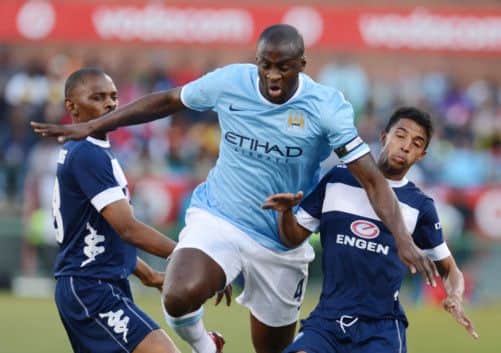 Manchester Citys Yaya Toure, centre, during the 20 defeat to Super Sport United. Picture: Getty