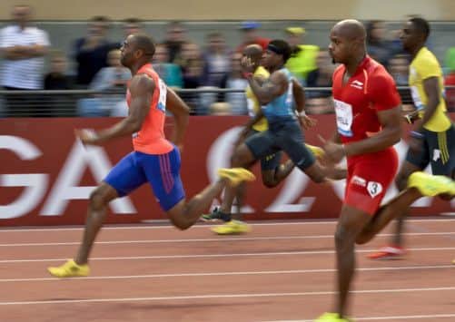 Gay (orange and blue) and Powell (red) have both failed drug tests. Picture: AP