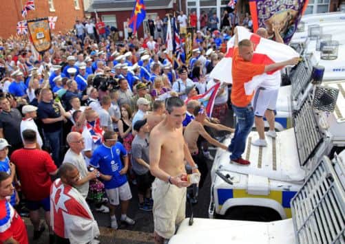 Loyalists confront police in north Belfast. Picture: PA