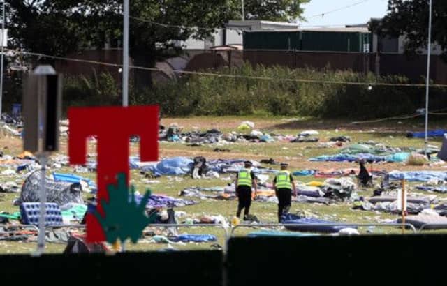 Festival goers leave the T In The Park campsite. Picture: PA