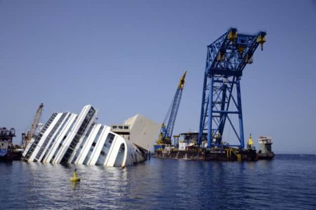 Salvage crews work to float the shipwrecked Costa Concordia. Picture: AP