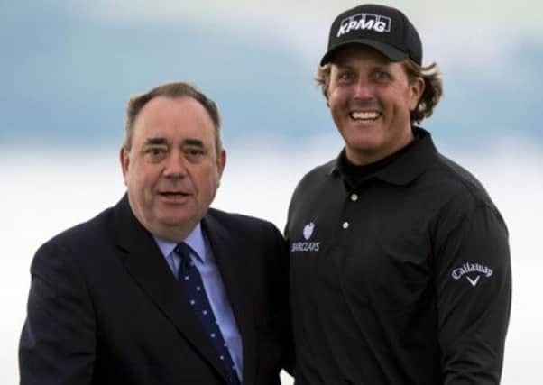 Alex Salmond congratulates Phil Mickelson after his win in the Scottish Open. Picture: SNS