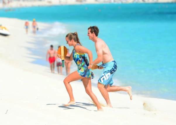 New Wimbledon champion Andy Murray is seen on holiday wtih girlfriend Kim Sears. Picture: Vantage