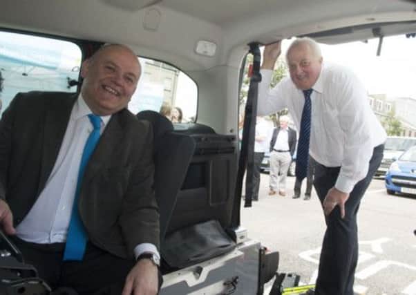 Council leader Barney Crockett and Co-Wheels co-ordinator Tony Archer launching the vehicle. Picture: Aberdeen City Council