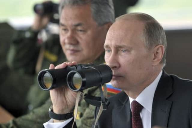 Military exercises were watched by Vladimir Putin. Picture: Reuters