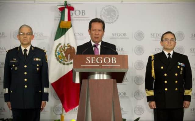 Security spokesman of the Goverment Eduardo Sanchez (C) speaks about the capture of Trevino. Picture: Getty