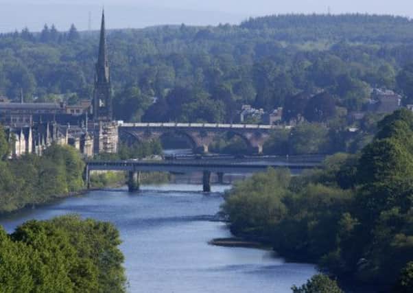 Police have issued a warning over 'tombstoning' after a man jumped off the Queen's Bridge at Perth. Picture: TSPL