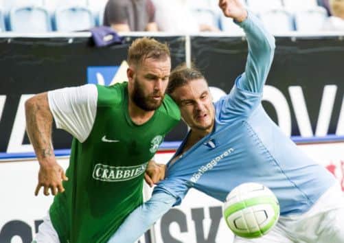 Rowan Vine tussles with Malmo's  Erik Johansson. Picture: SNS