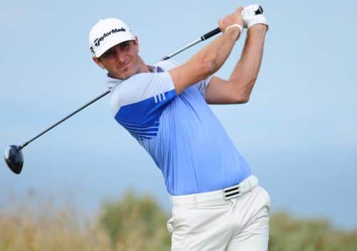Dustin Johnson: Touched his toes. Picture: Ian Rutherford