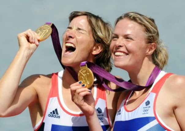 Katherine Grainger and Anna Watkins with their gold medals. Picture: Ian Rutherford