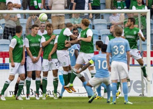 Jiloan Hamad puts Malmo 1-0 up against Hibs - the Easter Road side have to overturn a 2-0 scoreline to progress. Picture: SNS