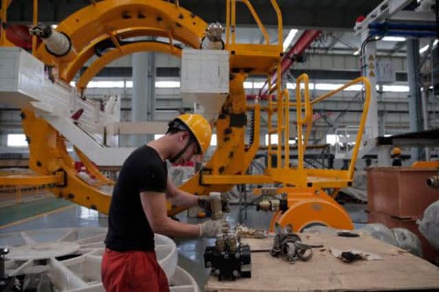 The Chinese economy may be growing more slowly but it is still outperforming many of its rivals. Picture: Getty