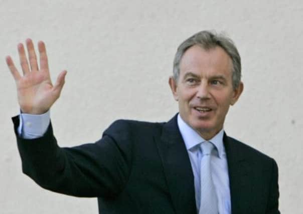 Tony Blair faces criticism over his promises to President George W Bush of the UK supporting the US in a war. Picture: AP