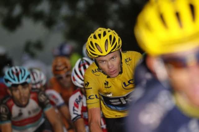 Chris Froome powers through the rain between Bourg-dOisans and Le Grand-Bornand  Picture: Getty