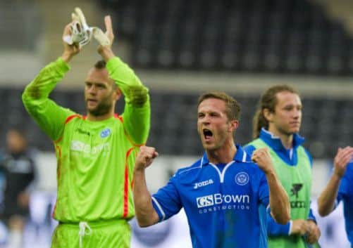 St Johnstone's Alan Mannus, left, and Chris Millar celebrate. Picture: SNS