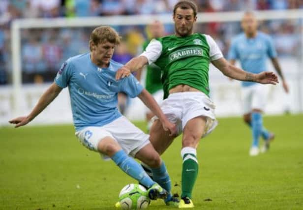Kevin Thomson could not prevent Hibs falling to a 2-0 first leg defeat to Malmo but the tie is retrievable says Pat Fenlon. Picture: Craig Williamson/SNS