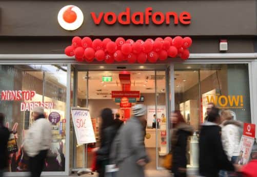 Shoppers pass a Vodafone shopn Berlin, Germany. Picture: Getty
