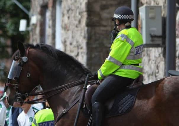 Police on horseback during an Orange Order parade in Dumbarton. Picture: Getty
