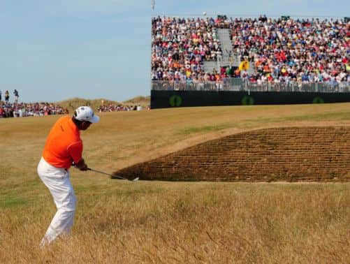Leader Lee Westwood plays from the rough. Picture: Ian Rutherford