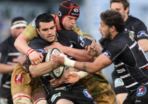 Oyonnax flanker Scott Newlands tackles Brive standoff Thomas Larajeira during a Pro D2 match last season. Picture: AFP/Getty