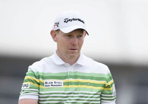 Stephen Gallacher, who finished top Scot in the 142nd Open Championship, walks off the 14th green yesterday after holing his par puttPicture: Kenny Smith/SNS
