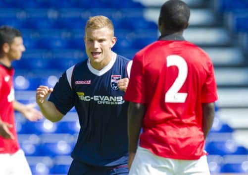 Ross Countys Alex Cooper celebrates after giving the Staggies a 21 lead over a Manchester United XI in Dingwall. Picture: Craig Watson/SNS