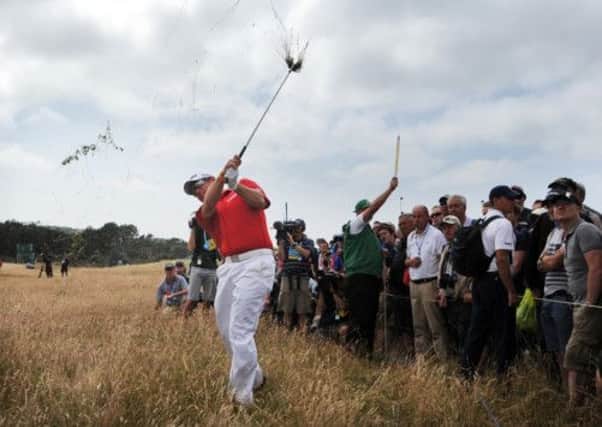 Lee Westwood plays from the rough at the third hole during the final round of the Open Championship yesterday. Picture: Jane Barlow