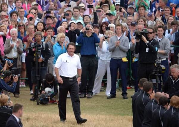 Spectators at Muirfield flock to get a view of the 2013 Open champion Phil Mickelson. Picture: Jane Barlow