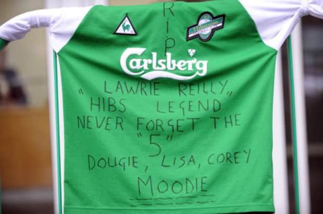 Tributes to Lawrie Reilly were left at Easter Road, and fans will pay tribute to the legend before the Malmo game. Picture: Jane Barlow