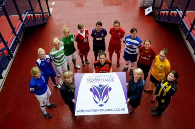 Alison Walker, bottom second right, and sports minister Shona Robison MSP, bottom second left, join the club captains. Picture: SNS
