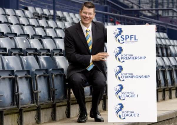 SPFL Chief Executive Neil Doncaster helps to launch the new Scottish Professional Football League brand. Picture: SNS