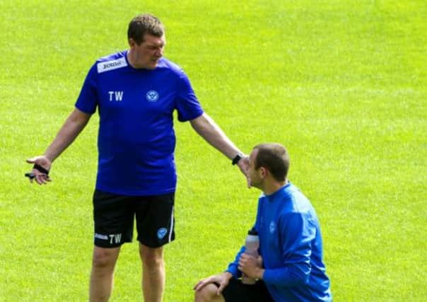 St Johnstone manager Tommy Wright, left, talks with Dave Mackay at training yesterday. Picture: SNS