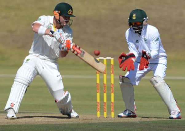David Warner steers the ball away as Australia A reached 399 for five on the opening day. Picture: Getty