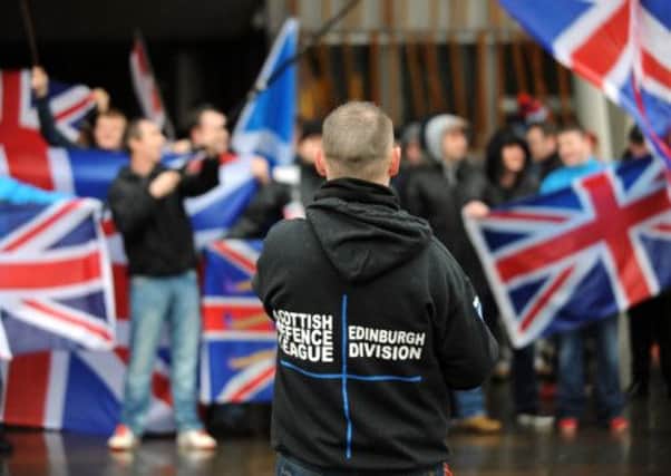 Scottish Defence League demonstrators pictured protesting outside the Scottish Parliament in December of last year. Picture: Jane Barlow