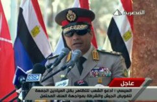 General Abdel Fattah alSisi speaks during a live broadcast. Picture: Getty