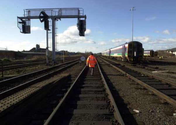 Rail workers will douse tracks with sprinklers and paint them in an attempt to prevent repeats of the havoc that the weather has caused to transport networks. Picture: Ian Rutherford