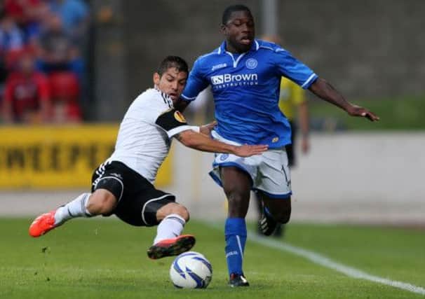 St Johnstone's Nigel Hasselbaink is challenged by Rosenborg Cristian Gamboa. Picture: PA