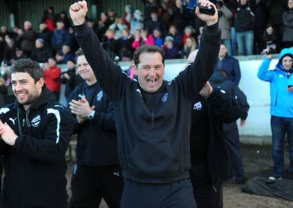 Kenny Murray celebrates as Ayr secure the league title in February. Picture: Robert Perry