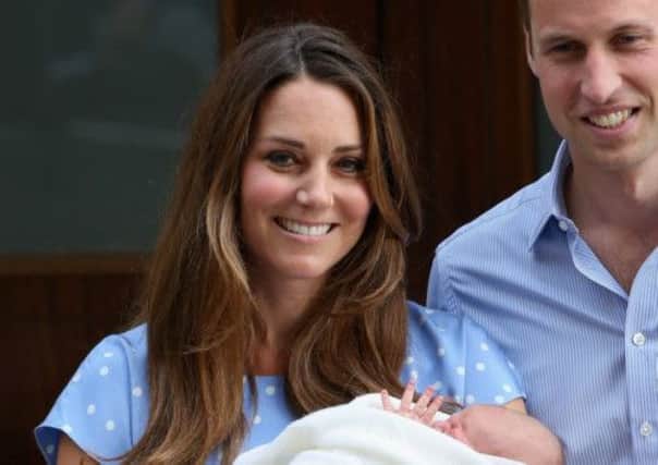 The Duchess of Cambridge, pictured with Prince William and the new royal baby George. Picture: Getty