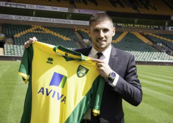 Gary Hooper with his new Norwich strip. Picture: Canaries.co.uk