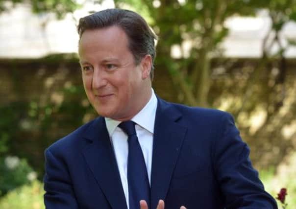 Cameron appeared to backtrack when he suggested the Sun's Page 3 models wouldn't be blocked. Picture: Getty