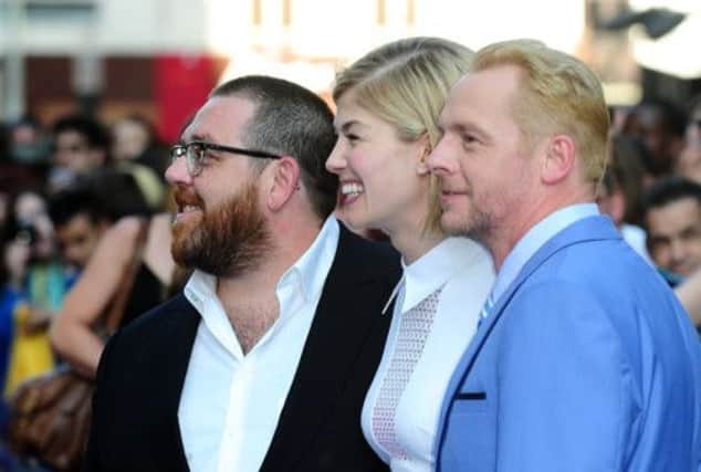 Nick Frost, Rosamund Pike and Simon Pegg arriving for the world premiere of The World's End. Picture: PA