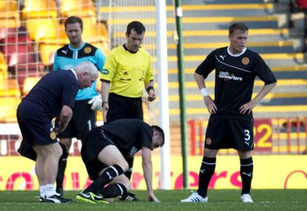 Stephen McManus was forced to come off due to injury. Picture: SNS