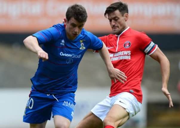 Aaron Doran of Inverness and Johnnie Jackson of Charlton contest the ball. Picture: Getty