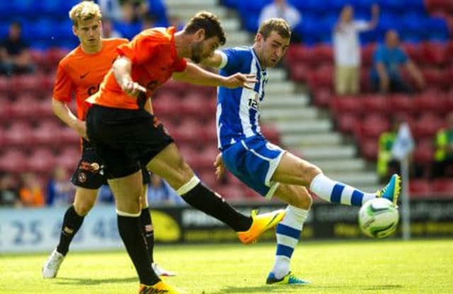 Nadir Ciftci scores Dundee United's clincher from 25 yards at the DW Stadium yesterday. Picture: SNS