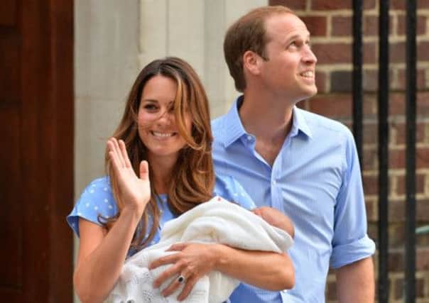 The Duke and Duchess of Cambridge with their newborn son Prince George on Tuesday. Picture: Getty