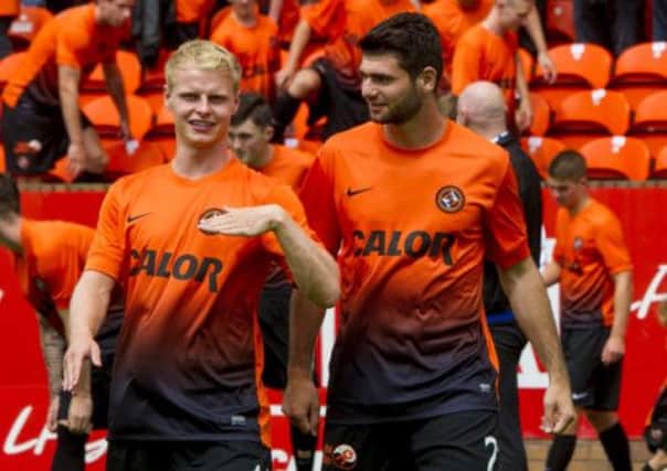 Nadir Ciftci, right, netted from 25 yards out. Picture: SNS
